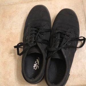 All black low cut vans